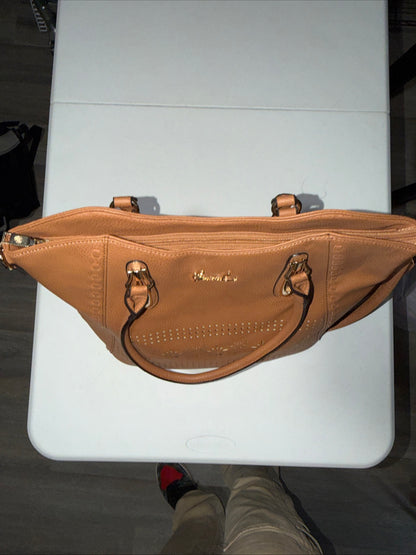 LerssaCi Tan Handbag With perforated floral cutouts and gold-toned hardware.