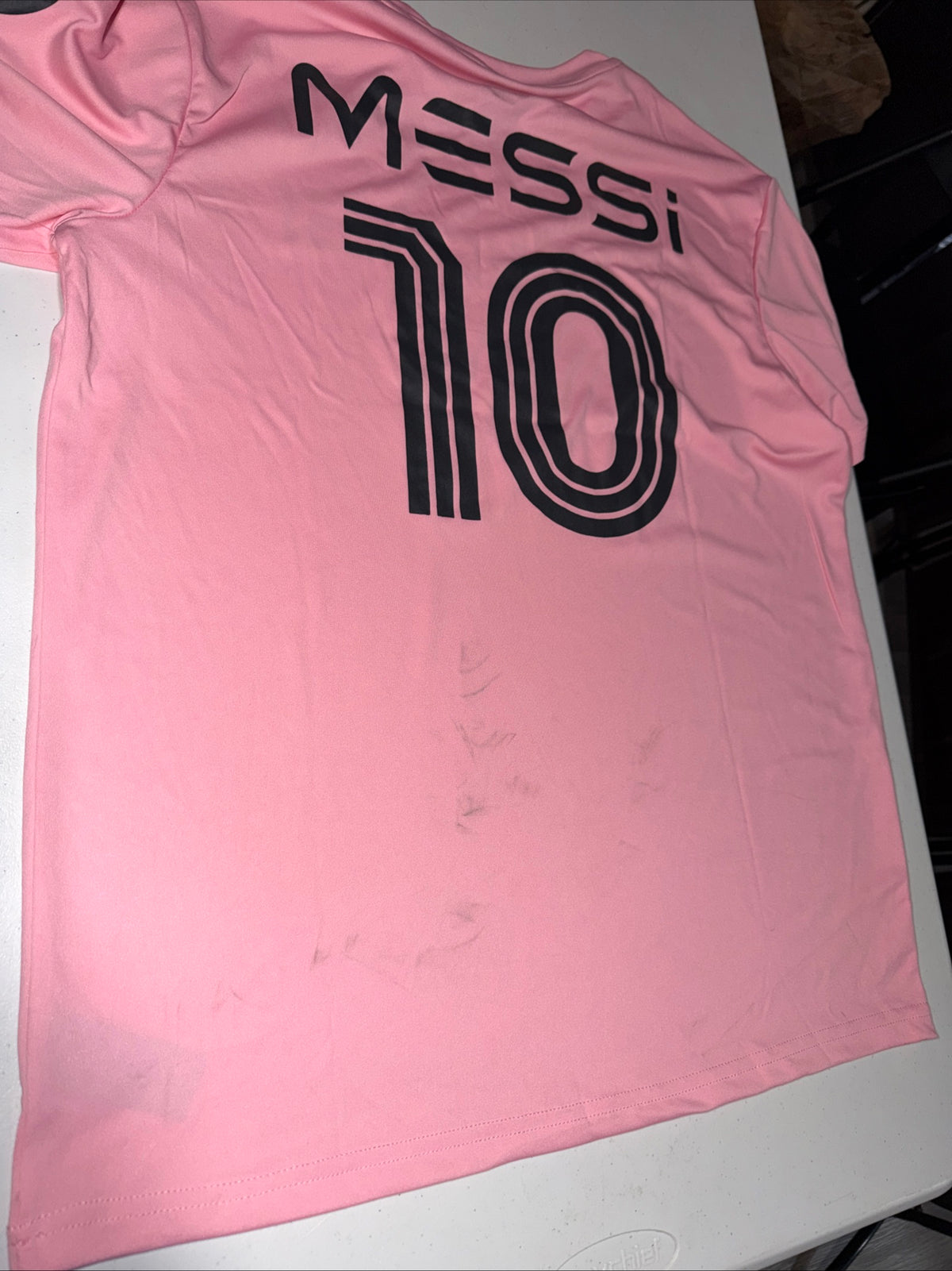 Pink Adidas Messi Jersey Top Features a prominent black logo graphic Size M