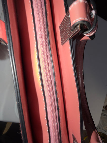A Iridescent Glossy Pink Plastic Tote Bag with Handles