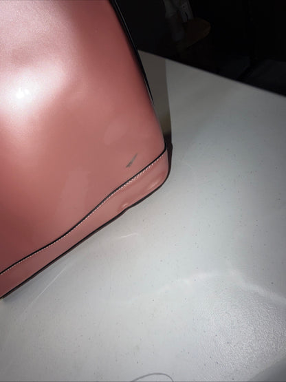 A Iridescent Glossy Pink Plastic Tote Bag with Handles